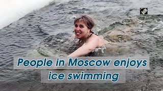 People in Moscow enjoys ice swimming [upl. by Teirrah]