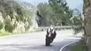 Motorcycle flips over cliff in scary crash caught on tape [upl. by Onilecram953]